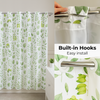 Botanical design shower curtain in green with no hooks required, includes detachable liner.
